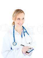 Glowing female doctor writing in her notepad