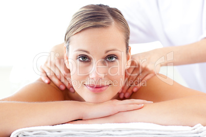 Glowing caucasian woman enjoying a back massage