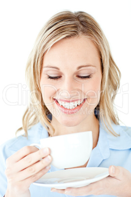 Glowing businesswoman holding a cup of coffee