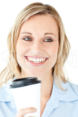 Delighted businesswoman holding a cup of coffee