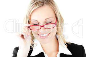 Pretty businesswoman holding red glasses