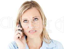 Frustrated businesswoman talking on phone