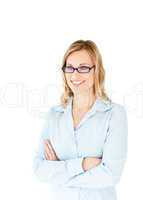 Confident businesswoman with folded arms smiling at the camera