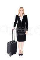 Smiling young businesswoman holding a suitcase