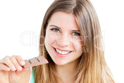 Young delighted woman holding chocolate