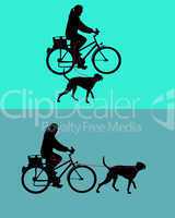 Radfahrerinnen mit Hunden an der Leine