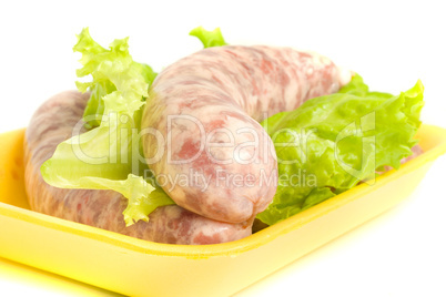 Closeup of one Uncooked Sausage