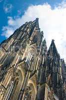 Towers of Koelner Dom Cologne Cathedral over blue sky