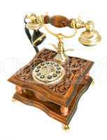 Antique telephone isolated over white