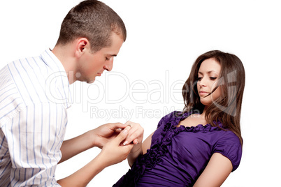 Woman and man posing on a white background