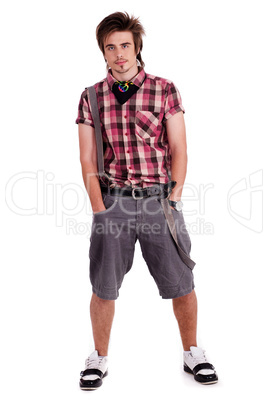 Cool young guy with hands in his pockets