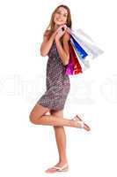 Cute happy woman holding her shopping bags