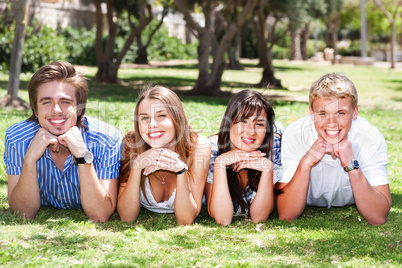 Four teens with hands on their chin