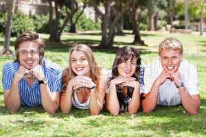 Four teens with hands on their chin