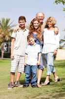 Grandparents with children, outdoors