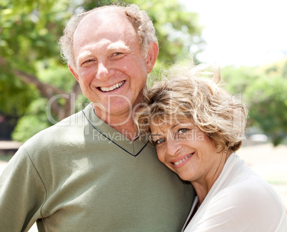 Loving, handsome senior couple