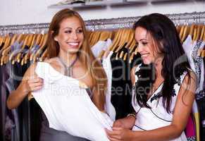 Female sales assistant helping buyer