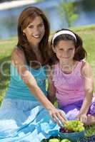 Woman and Girl, Mother & Daughter Eating Healthy Fruit Picnic