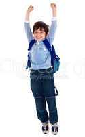 School boy raising his arms in joy