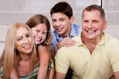 Portrait of happy family of four