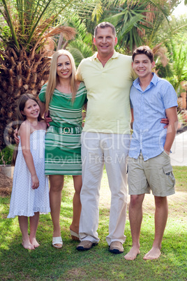 Portrait of happy family, outdoors