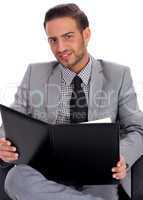 Young business man holding a clip board
