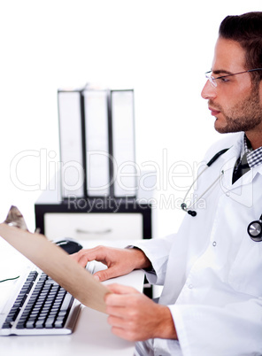 busy doctor working with his reports