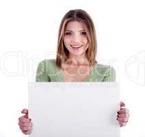 Charming young girl holding white bill board