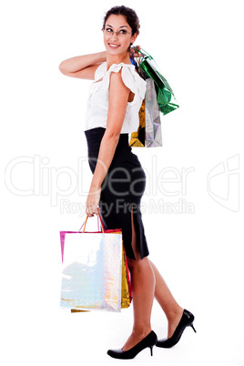 young woman holding shopping bags