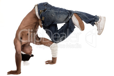 Dancer balancing his knees with his elbows