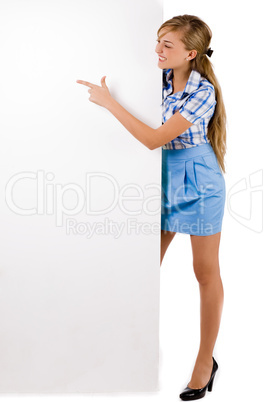 Business women pointing a white board
