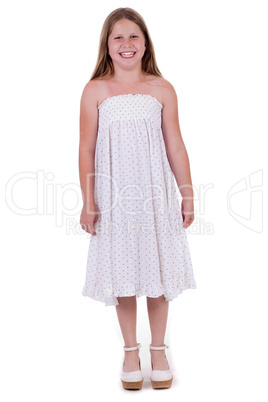 Full length of smiling young girl standing and looking at you