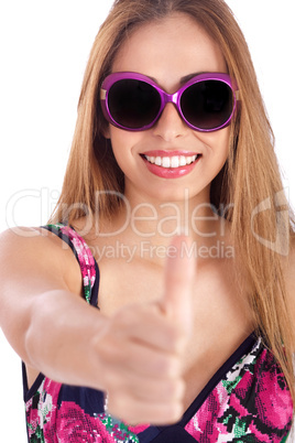 Young woman showing her thumbs up