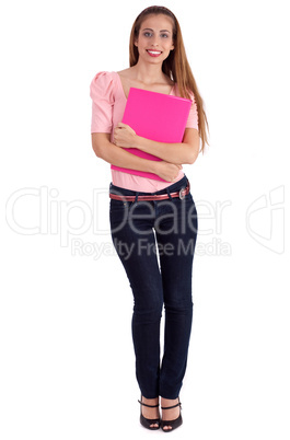Full length of pretty female student with a notebook