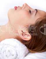 Close up shot of Sleeping young woman in the spa