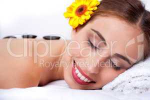 Beautiful young woman relaxing and smiling