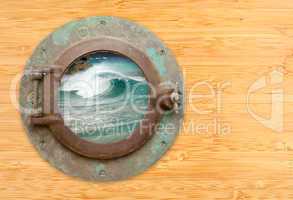 Antique Porthole with View of Crashing Waves on a Bamboo Wall Ba