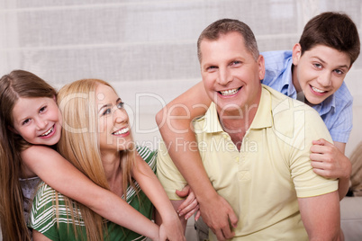 Portrait of lovely family having fun togethe