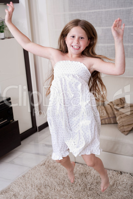 Young little girl jumping