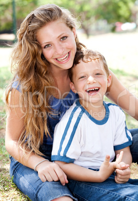 Mother posing with a cute little boy