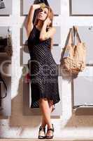 Gorgeous brunette model posing in retail shop