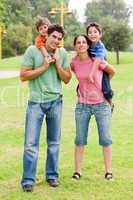 Couple giving piggyback ride