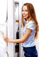Girl open a refrigerator