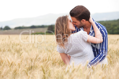 Happy young Couple hugging and kissing eachother