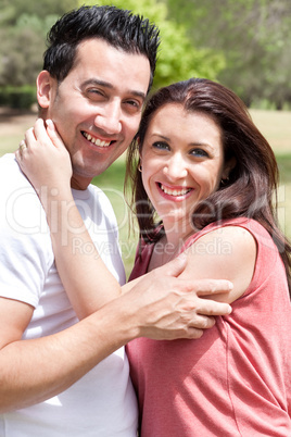 Closeup Portrait Of A Cute Couple Hugging