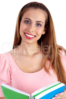 Beautiful smiling woman looking at you with open book on her hand