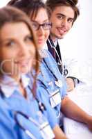 Hospital staff sitting in a row