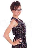 Cute girl wearing spectacles with hands on hips