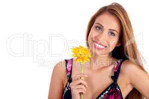 Beautiful smiling girl holding sun flower