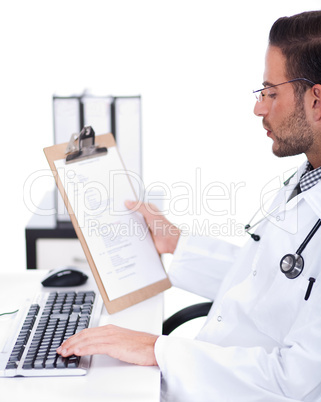 busy doctor working with his reports